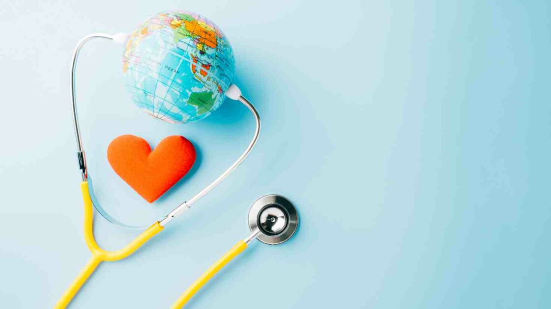 globe surrounded by a stethoscope, Global Health Insurance: Everything You Need to Know